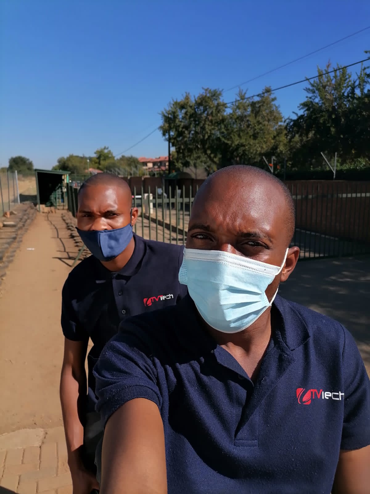 Accredited DStv technician installing decoder in Centurion